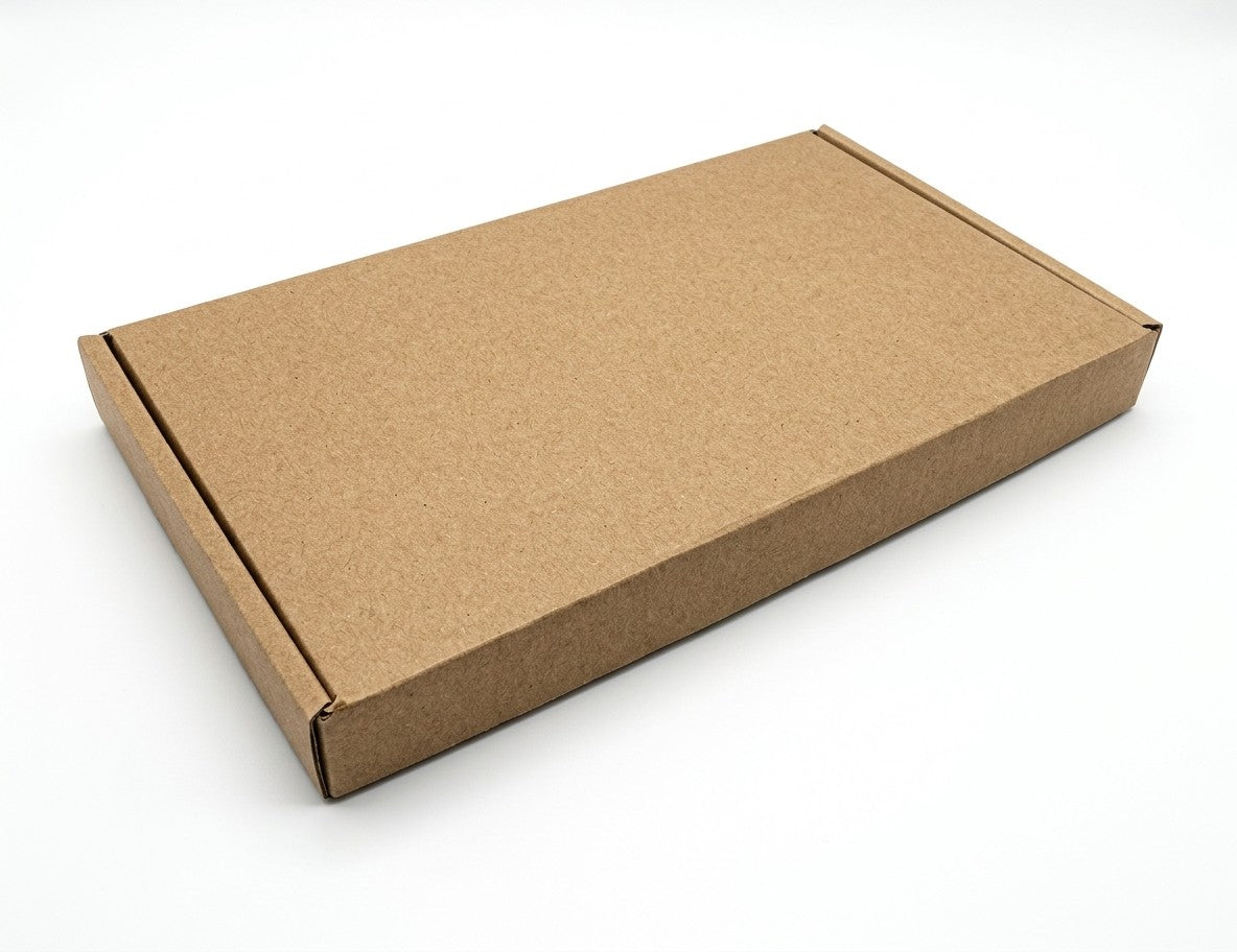 Laptop transit packaging set: the closed brown postal box