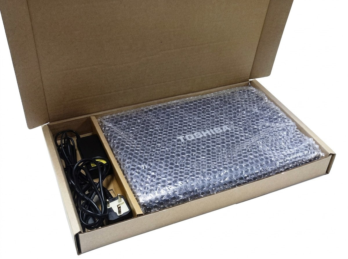 Laptop transit packaging set: an open postal box holding a bubble-wrapped laptop and its charger