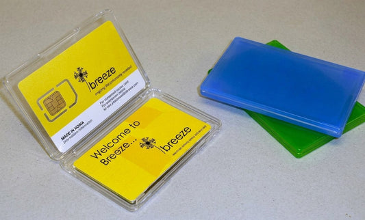 SIM and smart card moulded plastic cases in clear, blue and green, one open showing a SIM card and welcome card